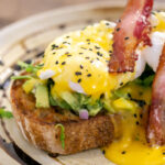 eggs benedict served with bacon