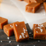 salted caramel homemade candy on wooden background