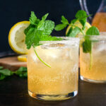 Lemonade Cocktails: Bourbon and lemonade cocktail served in sugar-rimmed glasses with garnish