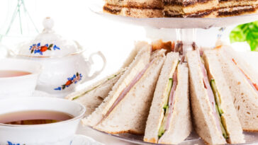 tea set served with tea sandwiches