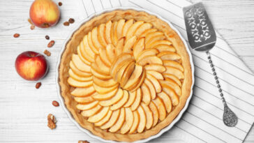 Homemade apple tart on wooden table