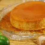 Filipino style crème caramel (leche flan) in caramel sauce shown with ingredients.