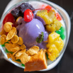 Filipino most favorite dessert, halo halo topped with ube ice cream.