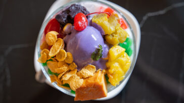 Filipino most favorite dessert, halo halo topped with ube ice cream.
