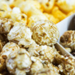 popcorn grains with cheese, caramel and chocolate.