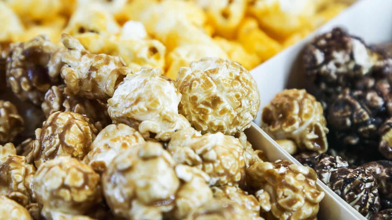 popcorn grains with cheese, caramel and chocolate.
