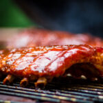 Smoked BBQ Ribs on Grill Egg Smoker Close Up