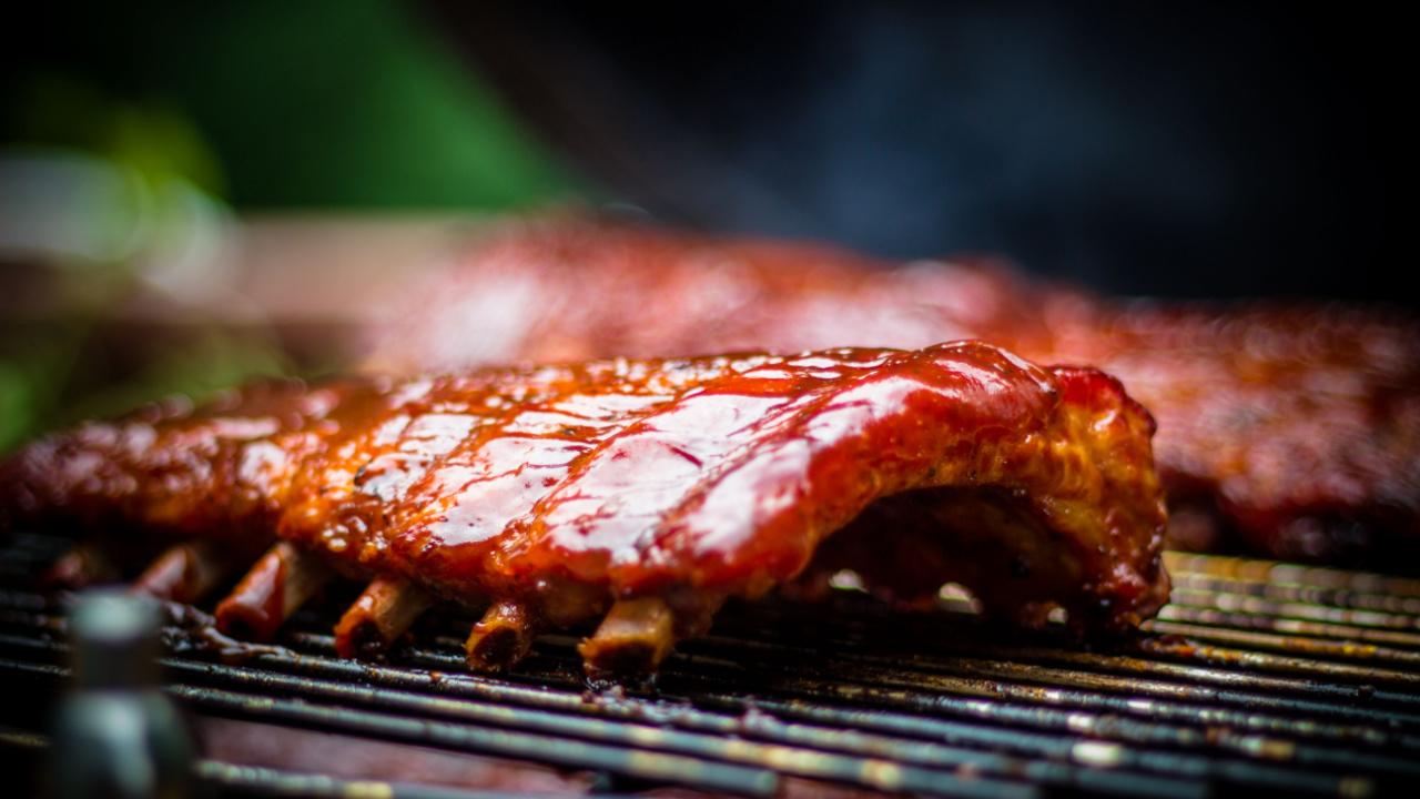 Smoked BBQ Ribs on Grill Egg Smoker Close Up