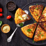Potato Farls, Irish Potato Cakes, potato bread on black plate