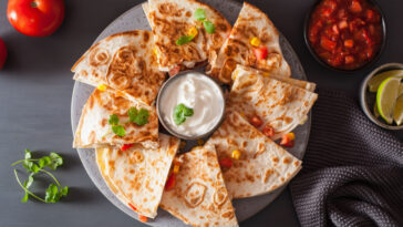 mexican quesadilla with chicken tomato corn cheese - a mexican appetizers
