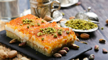 Basbousa with cream and pistachio is one of the traditional dishes in the Middle East