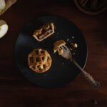 Mini Apple Pie Tarts in dark style food image