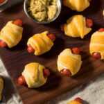 Homemade Pigs in a Blanket with Mustard and Ketchup