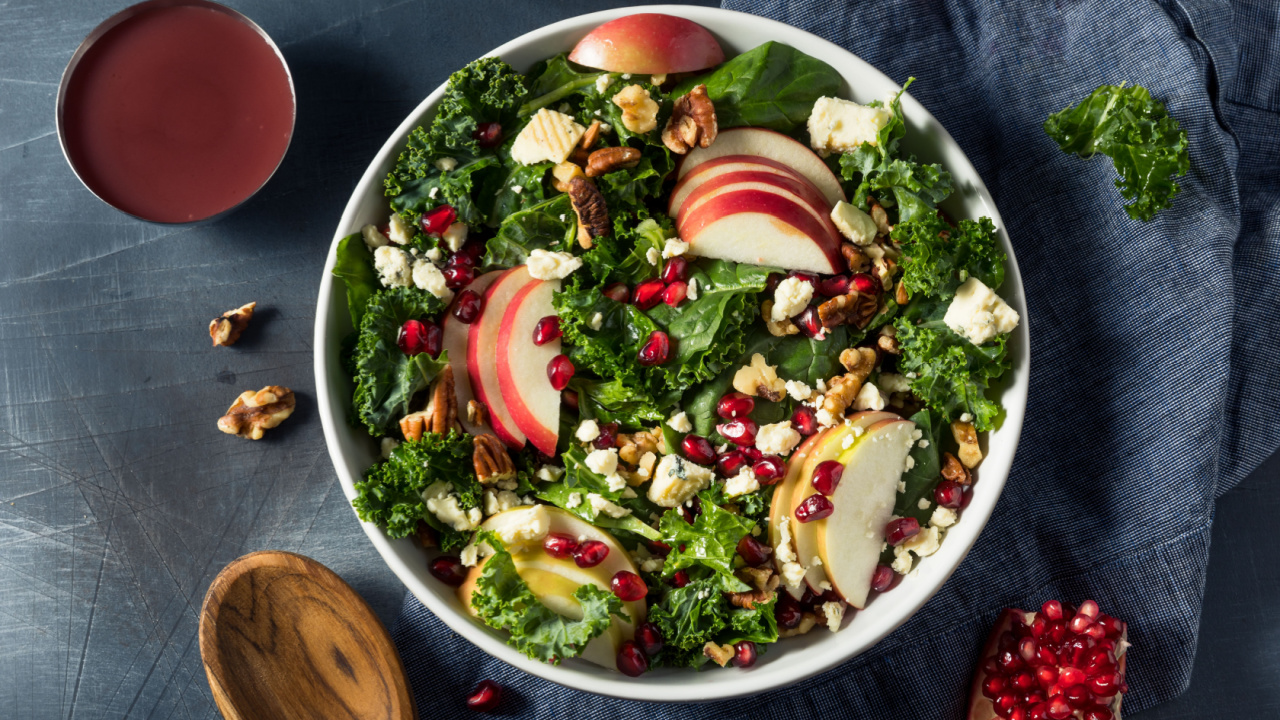 Homemade Autumn Pomegranate Apple Salad with Kale.