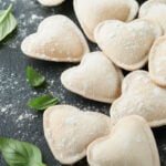 Italian ravioli pasta in heart shape.