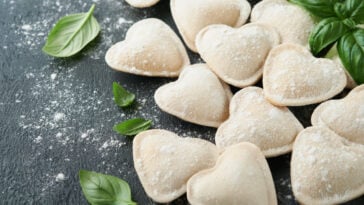 Italian ravioli pasta in heart shape.