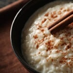 Delicious rice pudding with cinnamon in bowl