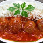 Pork meatballs in tomato sauce with rice