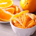 Homemade candied orange peel in a bowl