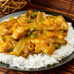 Chicken Curry with boiled rice a popular Chinese food.