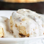 biscuits covered with thick white sausage gravy.