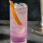 Boozy Refreshing Purple Empress Highball Cocktail with Grapefruit and Gin.