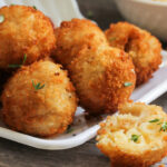 Fried Mac and Cheese balls served with ketch up