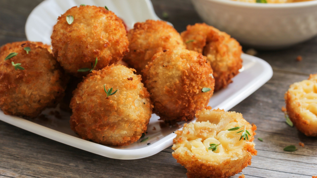 Fried Mac and Cheese balls served with ketch up