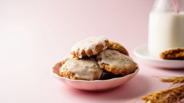 Homemade iced oatmeal cookies served with milk,