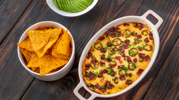 Dish of Jalapeno popper dip with cheese and bacon