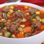 Closeup of a bowl of vegetable beef soup.