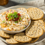 Homemade Million Dollar Cheese Dip with Bacon and Crackers