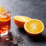 Negroni cocktail on dark stone table