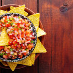 Mexican Pico de Gallo salsa and nacho chips.